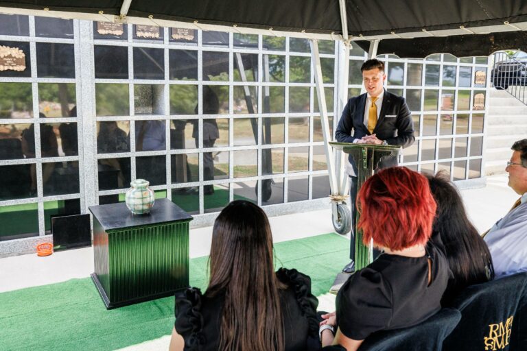 Certified celebrant leading cremation memorial service